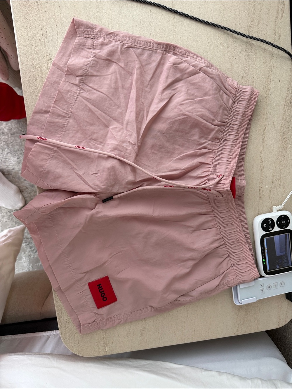 HUGO Light Pink Swim Shorts with Red Logo Patch